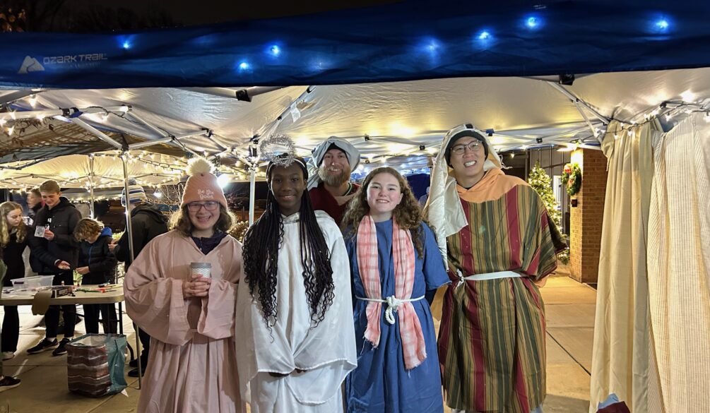 Five people dressed up for acting out the Nativity scene