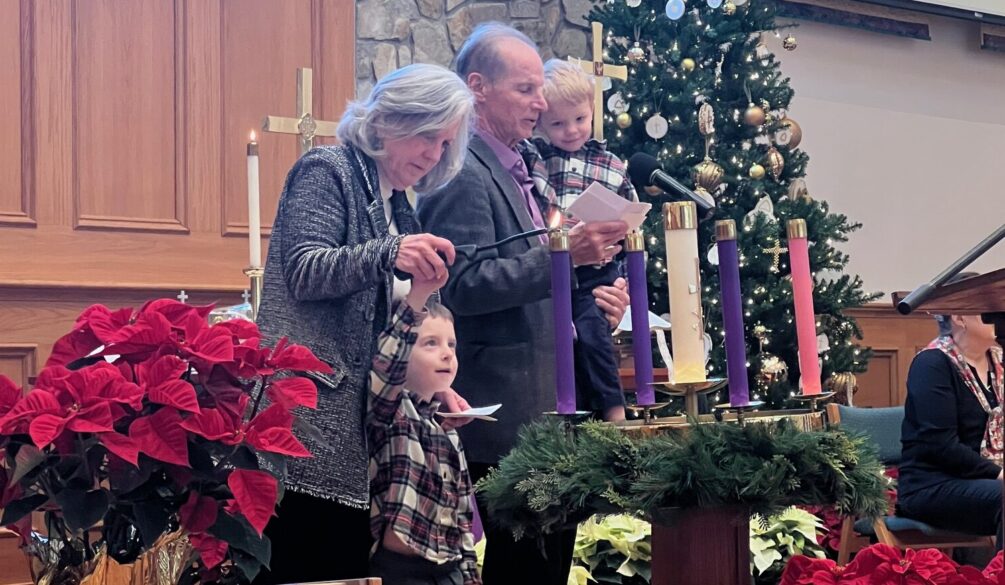 Jones family lighting the candle of peace