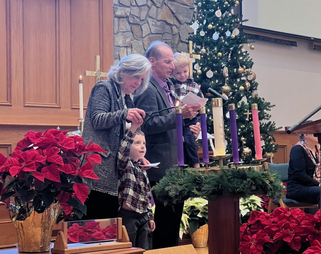 Jones family lighting the candle of peace