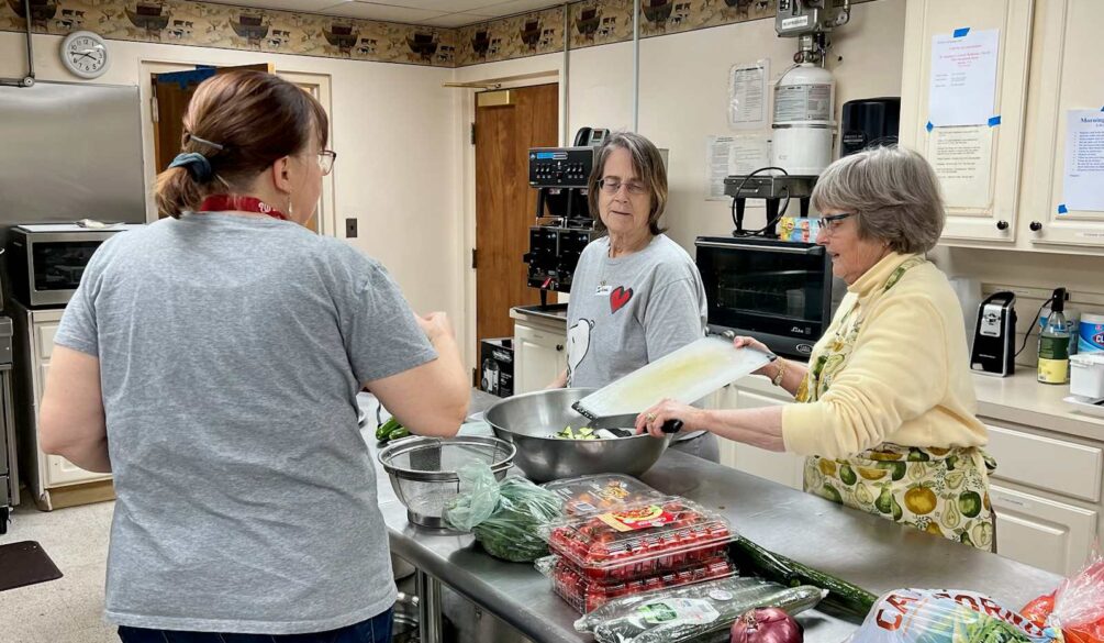 Women cooking for the hypothermia prevention program