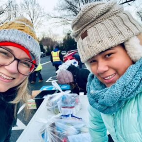 Mother and daughter volunteering at Grace Ministries