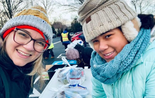 Mother and daughter volunteering at Grace Ministries
