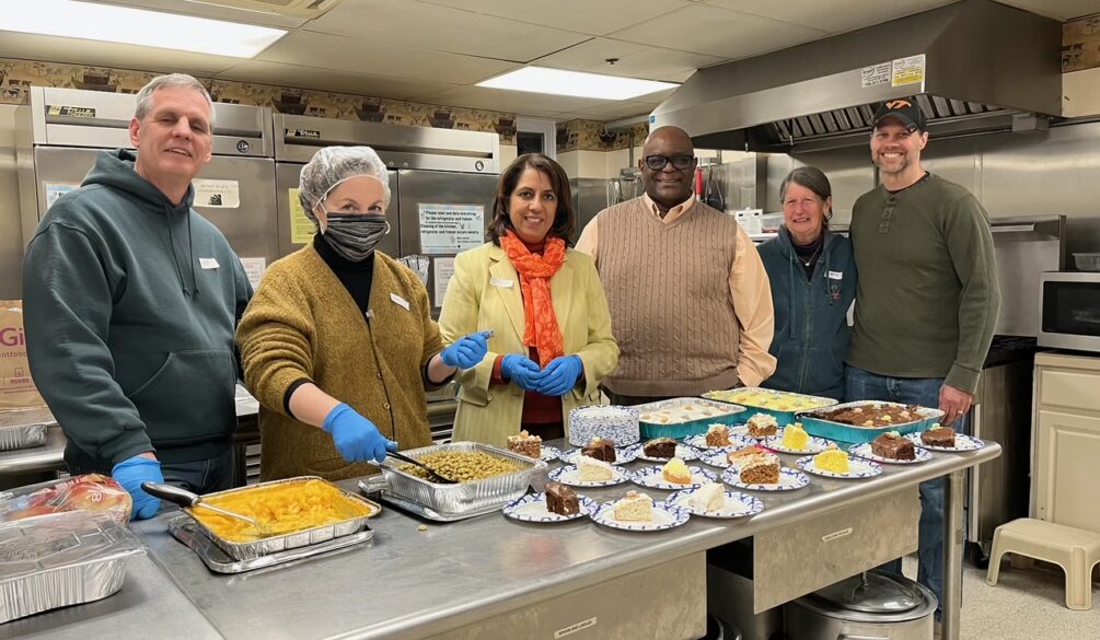 People in kitchen volunteering for hypothermia shelter