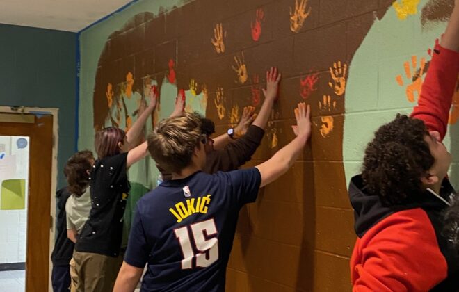 Youth group painting mural