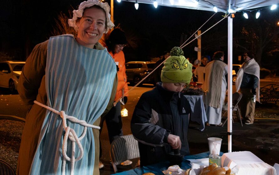 Serving challah bread at the Walk to Bethlehem