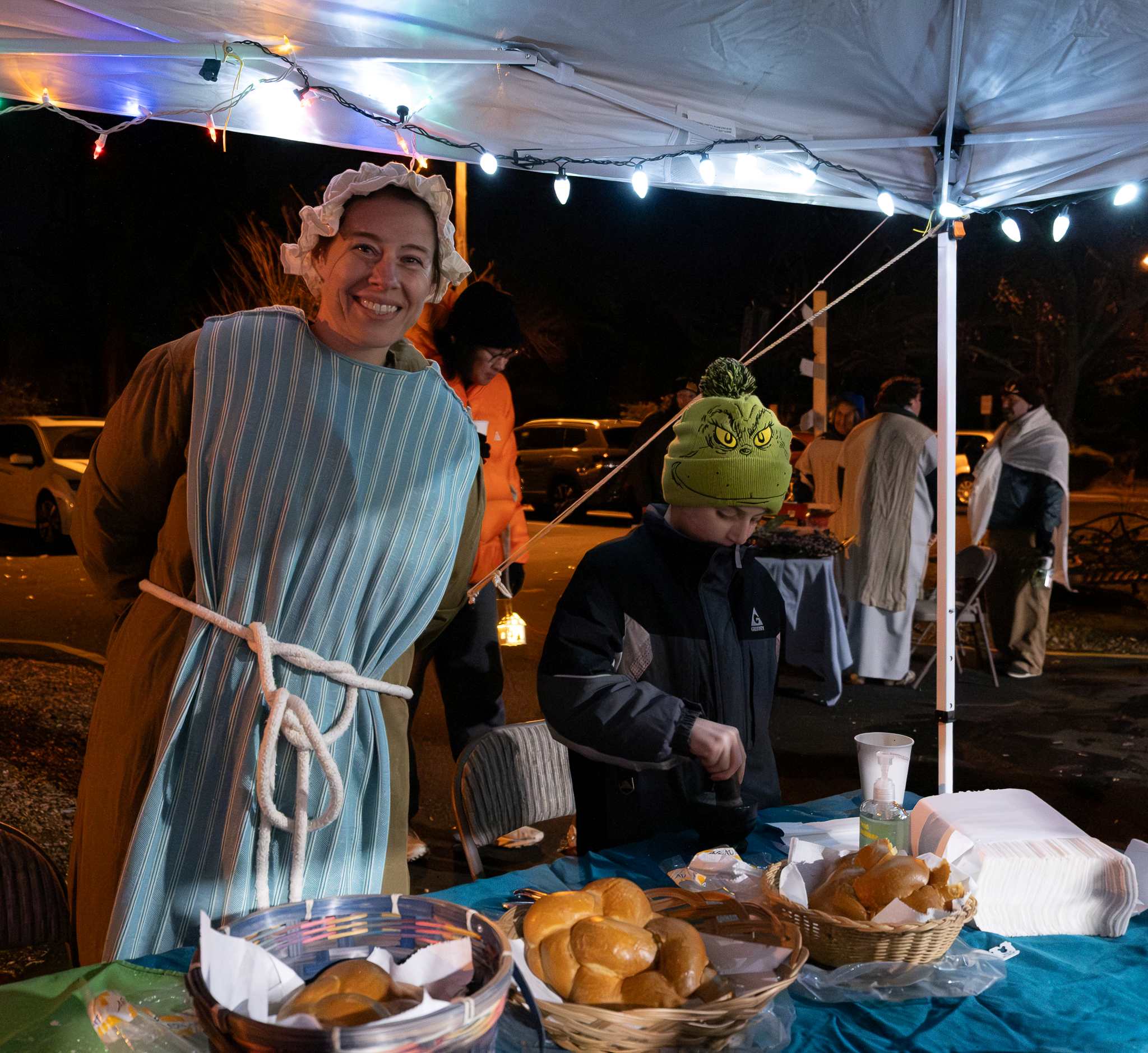 Serving challah bread at the Walk to Bethlehem